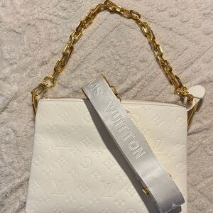 White Designer Shoulder Bag with Gold Chain
Fake LV purse